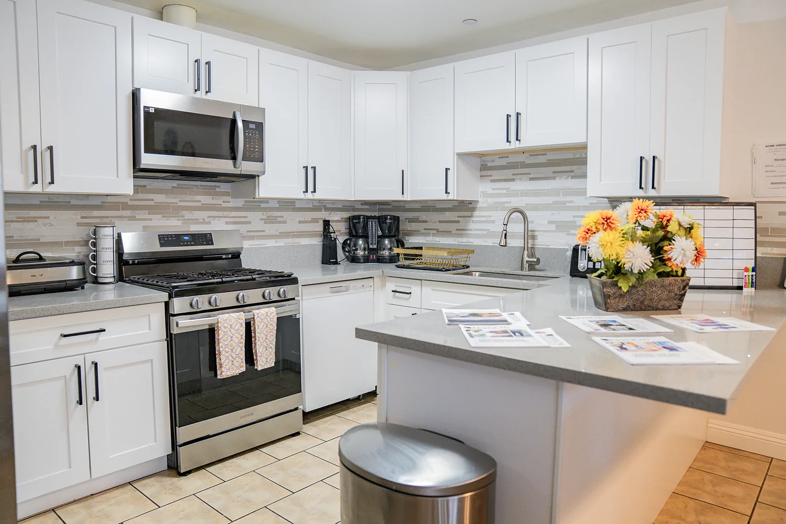Kitchen and dining area inside ACME Group Home in Las Vegas.